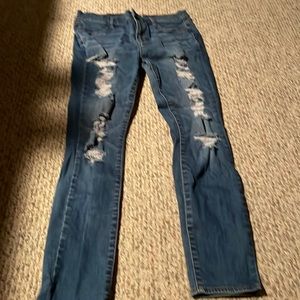 Blue ripped skinny jeans